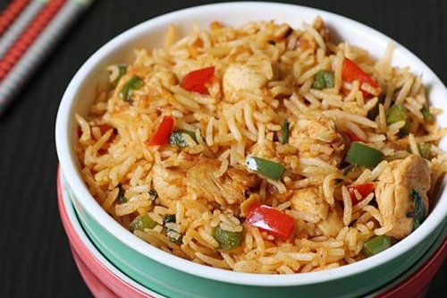Delicious Chicken Schezwan Fried Rice prepared by COOX