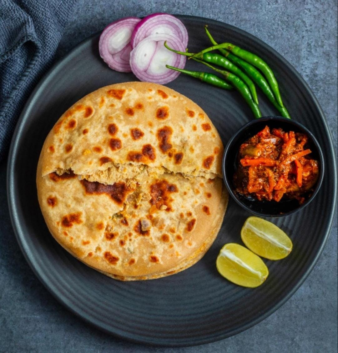 Delicious Sattu Parantha prepared by COOX